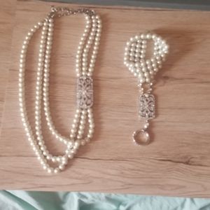 Necklace with matching bracelet finger chain